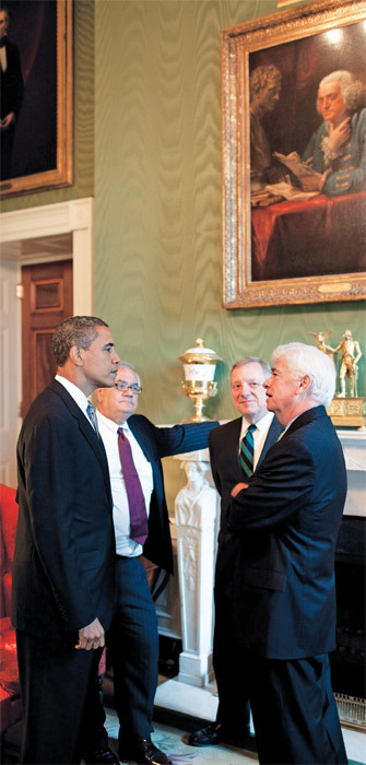 President Barack Obama meets with (from left) Representative Barney Frank and Senators Dick Durbin and Chris Dodd in the White House Green Room, June 17, 2009.