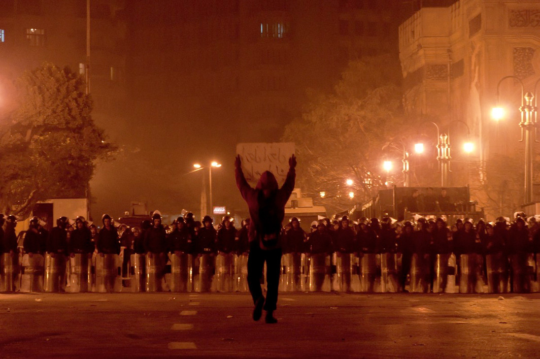 A protestor walking towards Tahrir Square in Cairo