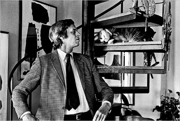 George Plimpton and Mr. Puss, the cat.