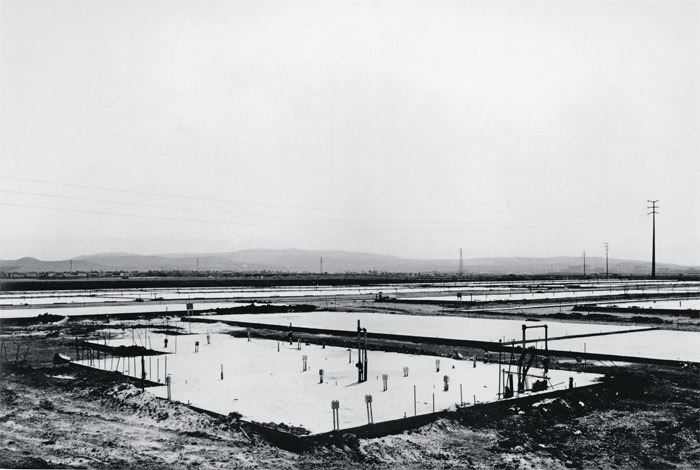 Lewis Baltz, Foundation Construction, Many Warehouses, 2891 Kelvin, Irvine, 1974, gelatin silver print, 6 x 9".