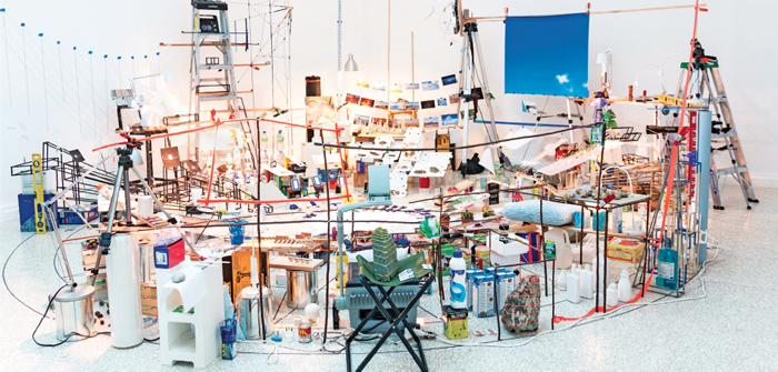Sarah Sze, Triple Point (Pendulum), 2013, salt, water, stone, string, projector, video, pendulum, and mixed media, dimensions variable.