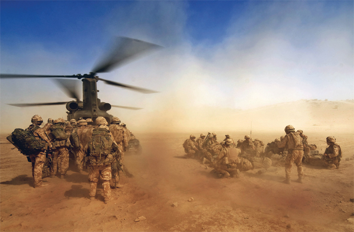 Soldiers boarding a Chinook helicopter in Afghanistan.