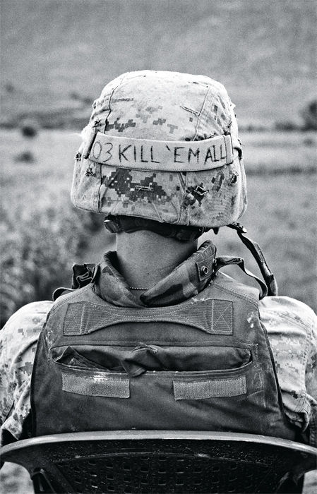 A US Marine on guard in Watapoor village in Kunar Province, Afghanistan, 2005.