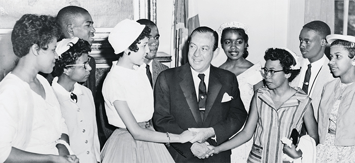 New York City mayor Robert Wagner welcomes teenagers from the newly integrated Central High School in Little Rock, Arkansas, 1958.