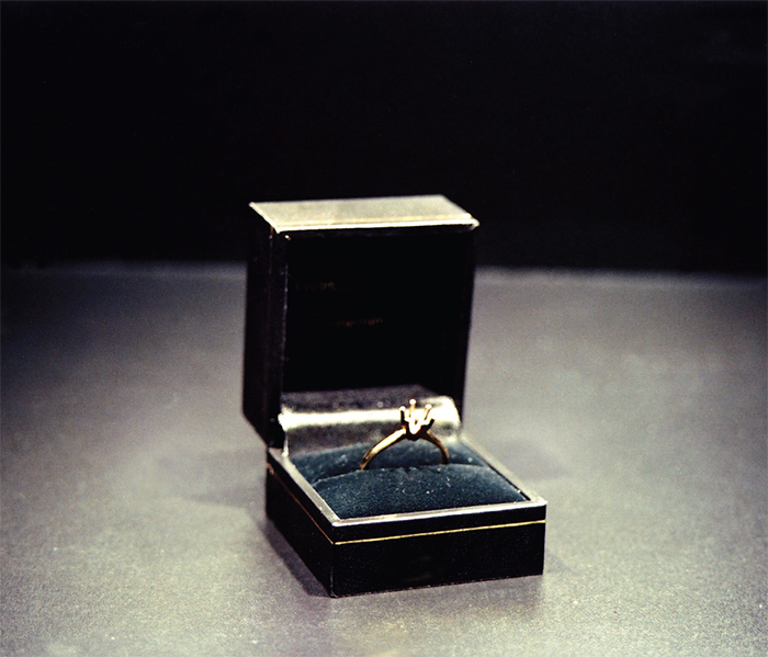 Jill Magid, Auto Portrait Pending, 2005, gold ring with empty setting, ring box, corporate and private contracts, dimensions variable.