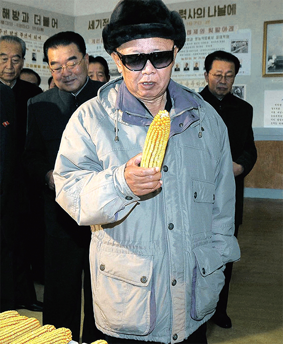 Kim Jong-Il inspecting an ear of corn at the Tongbong Cooperative Farm, North Korea, 2009. EPA/KCNA