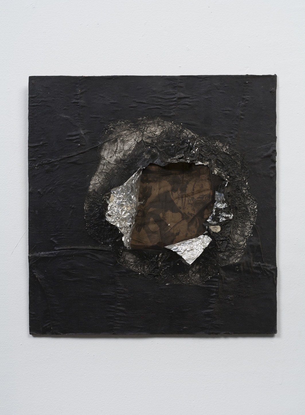 Jack Whitten, Birmingham, 1964. Aluminum foil, newsprint, stocking, and oil on plywood 16 5/8 x 16 in (42.2 x 40.6 cm). Collection Joel Wachs. © Courtesy the Jack Whitten Estate and Hauser & Wirth