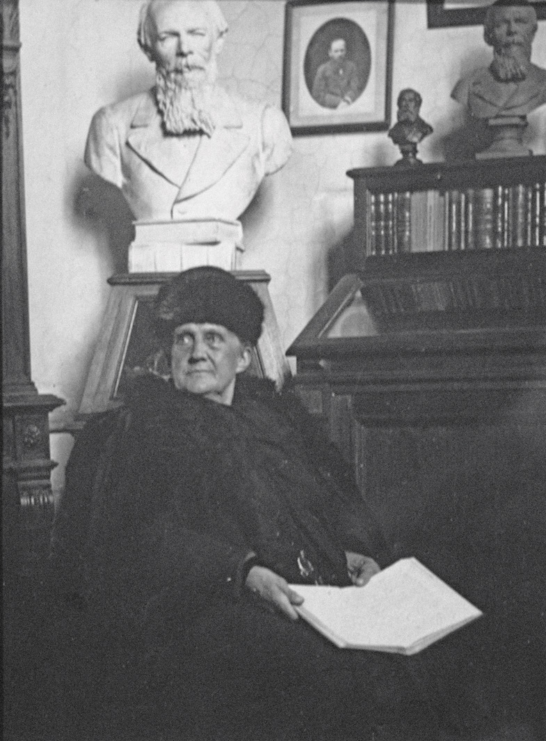 Anna Grigoryevna Dostyevskaya in the Dostoyevsky Room of the Historical Museum of Moscow, 1916. The Collection of State Central Literary Museum, Moscow.