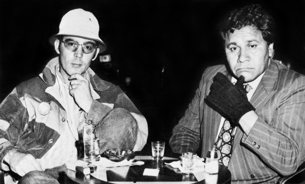Oscar Acosta persuaded Thompson to cover the Chicano movement in Los Angeles. While Thompson was researching “Strange Rumblings in Aztlan” the two men drove to Las Vegas, and Thompson returned with the beginnings of his Gonzo masterpiece.